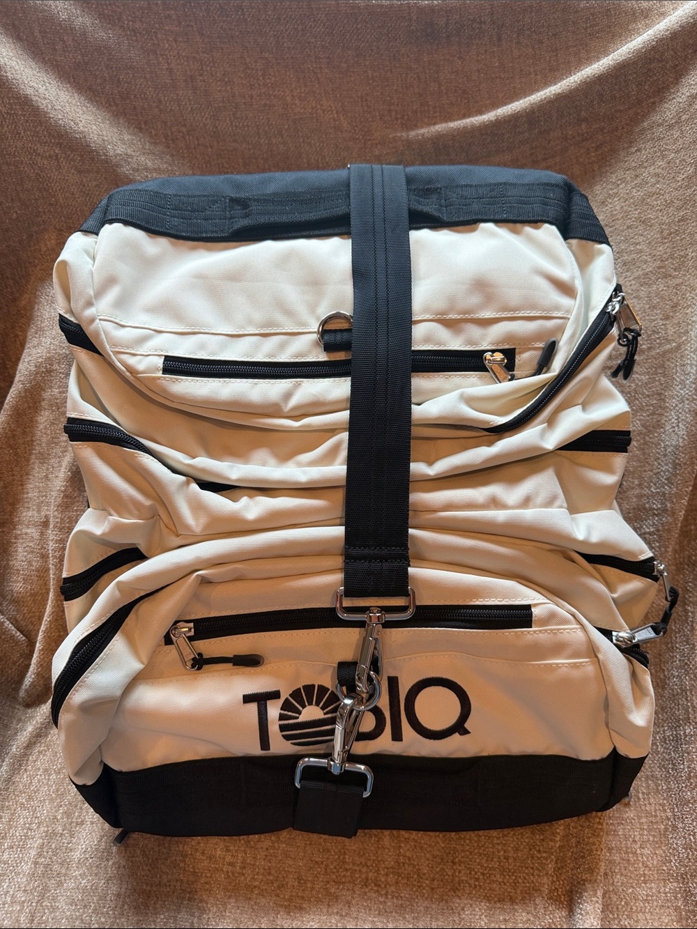 NWOT TOBIQ Cream and Black 30L Traveler Duffel